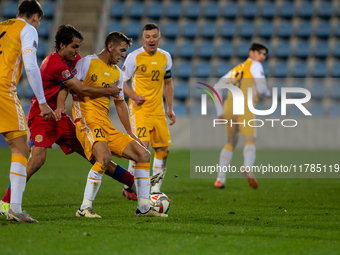 Players are in action during the UEFA Nations League 2024 - League phase - Matchday 4 match between Andorra and Moldova at Estadi Nacional d...