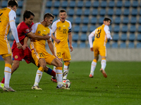 Players are in action during the UEFA Nations League 2024 - League phase - Matchday 4 match between Andorra and Moldova at Estadi Nacional d...