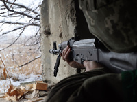 One of the new soldiers of the 57th Otaman Kost Hordiienko Motorized Brigade practices assault skills in the Kharkiv region, Ukraine, on Nov...