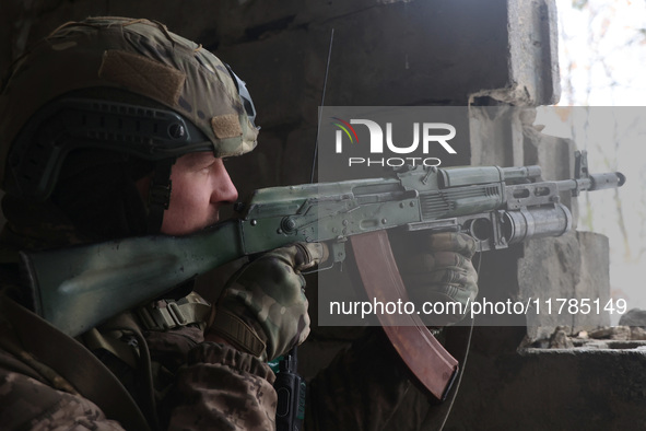 One of the new soldiers of the 57th Otaman Kost Hordiienko Motorized Brigade practices assault skills in the Kharkiv region, Ukraine, on Nov...