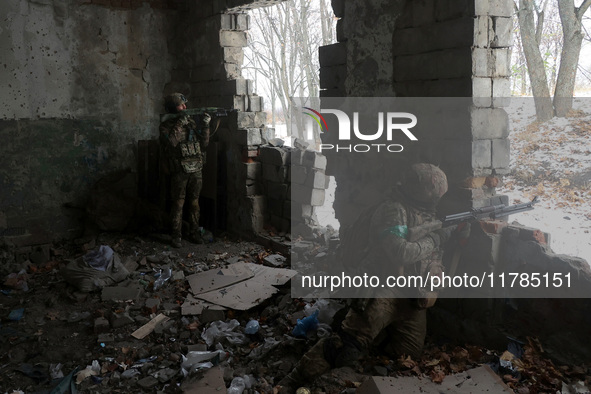 New soldiers of the 57th Otaman Kost Hordiienko Motorized Brigade practice assault skills in the Kharkiv region, Ukraine, on November 14, 20...