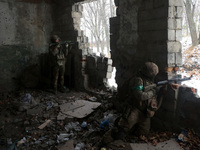 New soldiers of the 57th Otaman Kost Hordiienko Motorized Brigade practice assault skills in the Kharkiv region, Ukraine, on November 14, 20...