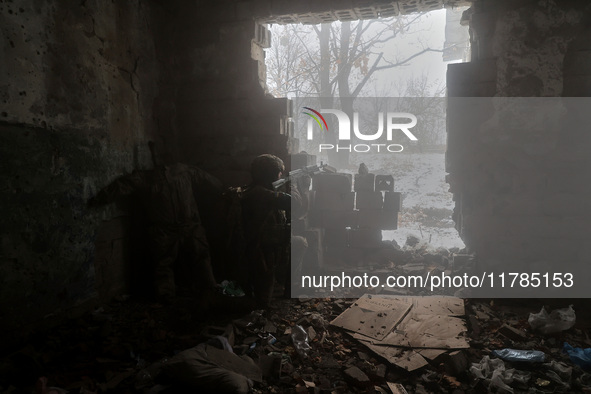 One of the new soldiers of the 57th Otaman Kost Hordiienko Motorized Brigade practices assault skills in the Kharkiv region, Ukraine, on Nov...