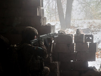 One of the new soldiers of the 57th Otaman Kost Hordiienko Motorized Brigade practices assault skills in the Kharkiv region, Ukraine, on Nov...