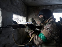 New soldiers of the 57th Otaman Kost Hordiienko Motorized Brigade practice assault skills in the Kharkiv region, Ukraine, on November 14, 20...