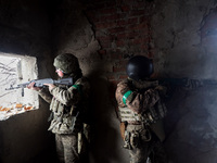 New soldiers of the 57th Otaman Kost Hordiienko Motorized Brigade practice assault skills in the Kharkiv region, Ukraine, on November 14, 20...