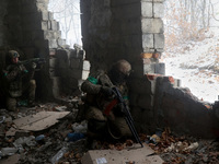 New soldiers of the 57th Otaman Kost Hordiienko Motorized Brigade practice assault skills in the Kharkiv region, Ukraine, on November 14, 20...