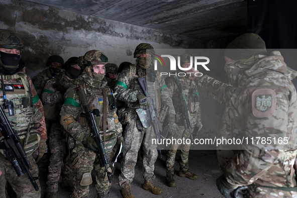 New soldiers of the 57th Otaman Kost Hordiienko Motorized Brigade practice assault skills in the Kharkiv region, Ukraine, on November 14, 20...