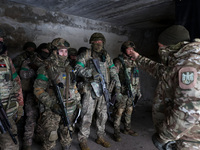 New soldiers of the 57th Otaman Kost Hordiienko Motorized Brigade practice assault skills in the Kharkiv region, Ukraine, on November 14, 20...