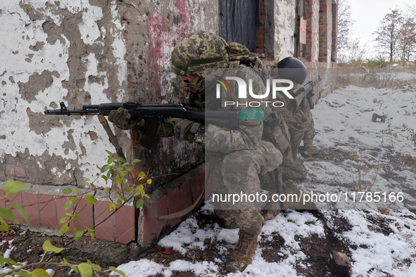 New soldiers of the 57th Otaman Kost Hordiienko Motorized Brigade practice assault skills in the Kharkiv region, Ukraine, on November 14, 20...