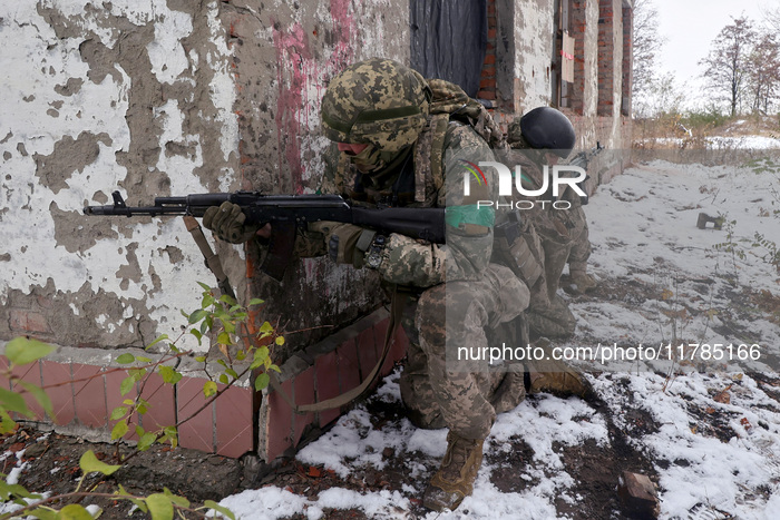 New soldiers of the 57th Otaman Kost Hordiienko Motorized Brigade practice assault skills in the Kharkiv region, Ukraine, on November 14, 20...