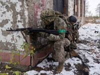 New soldiers of the 57th Otaman Kost Hordiienko Motorized Brigade practice assault skills in the Kharkiv region, Ukraine, on November 14, 20...