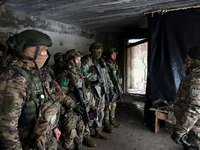 New soldiers of the 57th Otaman Kost Hordiienko Motorized Brigade practice assault skills in the Kharkiv region, Ukraine, on November 14, 20...