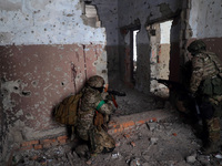 New soldiers of the 57th Otaman Kost Hordiienko Motorized Brigade practice assault skills in the Kharkiv region, Ukraine, on November 14, 20...