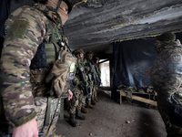 New soldiers of the 57th Otaman Kost Hordiienko Motorized Brigade practice assault skills in the Kharkiv region, Ukraine, on November 14, 20...