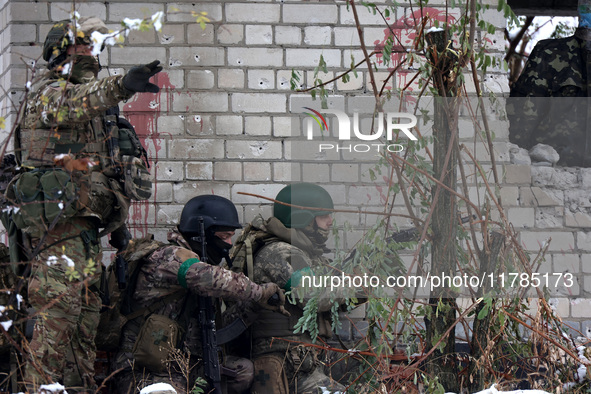 New soldiers of the 57th Otaman Kost Hordiienko Motorized Brigade practice assault skills in the Kharkiv region, Ukraine, on November 14, 20...