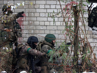 New soldiers of the 57th Otaman Kost Hordiienko Motorized Brigade practice assault skills in the Kharkiv region, Ukraine, on November 14, 20...