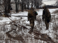 New soldiers of the 57th Otaman Kost Hordiienko Motorized Brigade practice assault skills in the Kharkiv region, Ukraine, on November 14, 20...