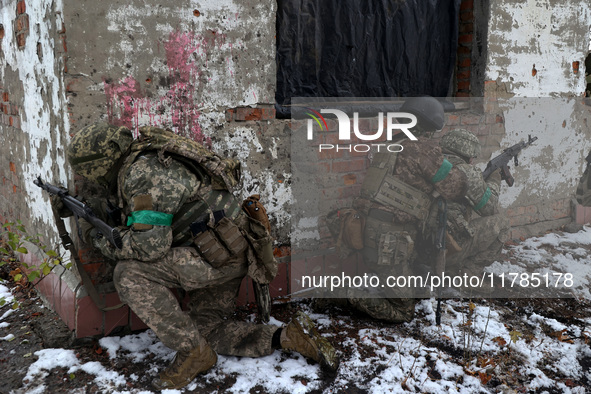 New soldiers of the 57th Otaman Kost Hordiienko Motorized Brigade practice assault skills in the Kharkiv region, Ukraine, on November 14, 20...