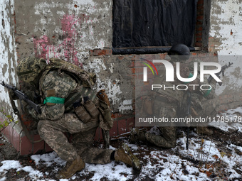 New soldiers of the 57th Otaman Kost Hordiienko Motorized Brigade practice assault skills in the Kharkiv region, Ukraine, on November 14, 20...