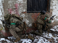 New soldiers of the 57th Otaman Kost Hordiienko Motorized Brigade practice assault skills in the Kharkiv region, Ukraine, on November 14, 20...