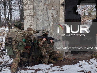 New soldiers of the 57th Otaman Kost Hordiienko Motorized Brigade practice assault skills in the Kharkiv region, Ukraine, on November 14, 20...