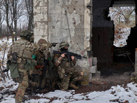 New soldiers of the 57th Otaman Kost Hordiienko Motorized Brigade practice assault skills in the Kharkiv region, Ukraine, on November 14, 20...