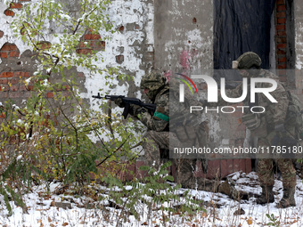 New soldiers of the 57th Otaman Kost Hordiienko Motorized Brigade practice assault skills in the Kharkiv region, Ukraine, on November 14, 20...