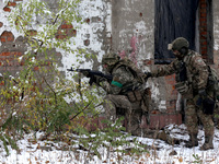 New soldiers of the 57th Otaman Kost Hordiienko Motorized Brigade practice assault skills in the Kharkiv region, Ukraine, on November 14, 20...