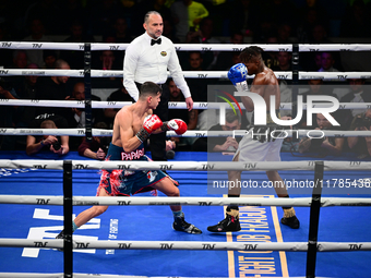 Francesco Paparo and Mohamed Diallo fight during the match for the Italian super featherweight title at TAF 7 at Allianz Cloud Milano in Mil...