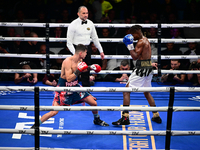 Francesco Paparo and Mohamed Diallo fight during the match for the Italian super featherweight title at TAF 7 at Allianz Cloud Milano in Mil...