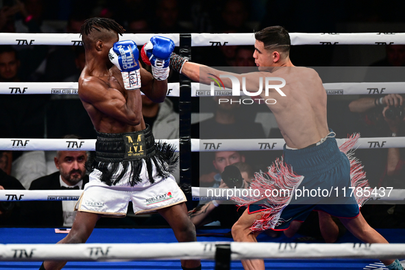 Francesco Paparo and Mohamed Diallo fight during the match for the Italian super featherweight title at TAF 7 at Allianz Cloud Milano in Mil...