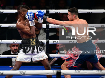 Francesco Paparo and Mohamed Diallo fight during the match for the Italian super featherweight title at TAF 7 at Allianz Cloud Milano in Mil...