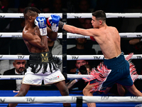 Francesco Paparo and Mohamed Diallo fight during the match for the Italian super featherweight title at TAF 7 at Allianz Cloud Milano in Mil...