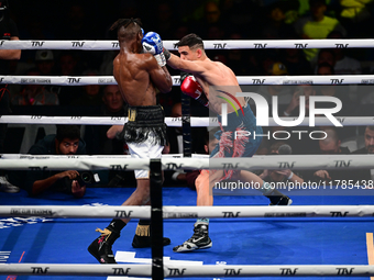 Francesco Paparo and Mohamed Diallo fight during the match for the Italian super featherweight title at TAF 7 at Allianz Cloud Milano in Mil...