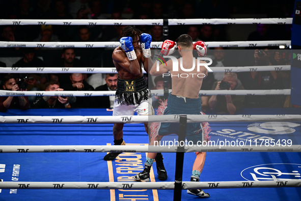 Francesco Paparo and Mohamed Diallo fight during the match for the Italian super featherweight title at TAF 7 at Allianz Cloud Milano in Mil...