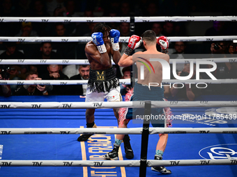 Francesco Paparo and Mohamed Diallo fight during the match for the Italian super featherweight title at TAF 7 at Allianz Cloud Milano in Mil...