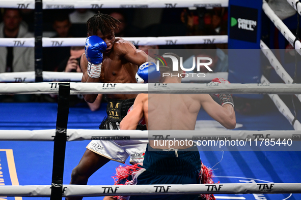 Francesco Paparo and Mohamed Diallo fight during the match for the Italian super featherweight title at TAF 7 at Allianz Cloud Milano in Mil...