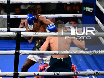 Francesco Paparo and Mohamed Diallo fight during the match for the Italian super featherweight title at TAF 7 at Allianz Cloud Milano in Mil...