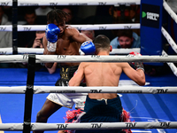 Francesco Paparo and Mohamed Diallo fight during the match for the Italian super featherweight title at TAF 7 at Allianz Cloud Milano in Mil...