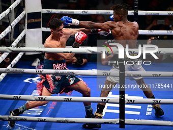 Francesco Paparo and Mohamed Diallo fight during the match for the Italian super featherweight title at TAF 7 at Allianz Cloud Milano in Mil...