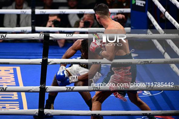 Francesco Paparo and Mohamed Diallo fight during the match for the Italian super featherweight title at TAF 7 at Allianz Cloud Milano in Mil...