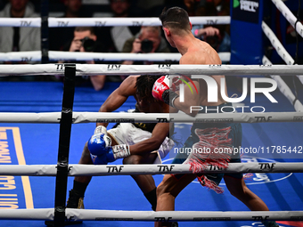 Francesco Paparo and Mohamed Diallo fight during the match for the Italian super featherweight title at TAF 7 at Allianz Cloud Milano in Mil...