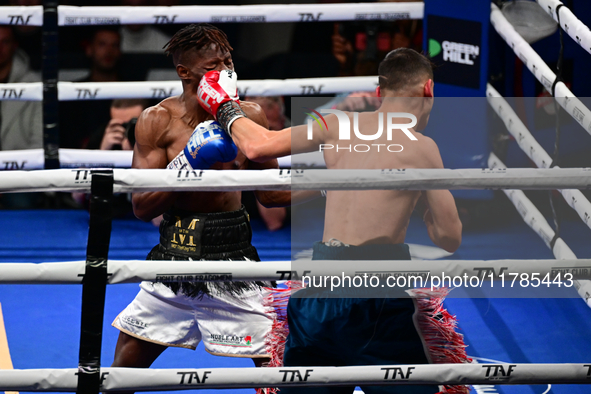 Francesco Paparo and Mohamed Diallo fight during the match for the Italian super featherweight title at TAF 7 at Allianz Cloud Milano in Mil...