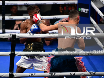 Francesco Paparo and Mohamed Diallo fight during the match for the Italian super featherweight title at TAF 7 at Allianz Cloud Milano in Mil...