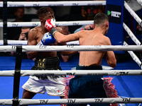 Francesco Paparo and Mohamed Diallo fight during the match for the Italian super featherweight title at TAF 7 at Allianz Cloud Milano in Mil...