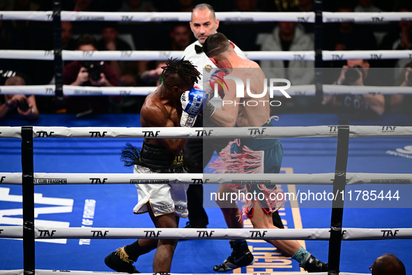 Francesco Paparo and Mohamed Diallo fight during the match for the Italian super featherweight title at TAF 7 at Allianz Cloud Milano in Mil...