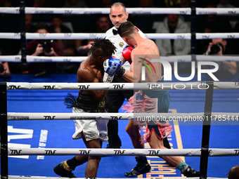 Francesco Paparo and Mohamed Diallo fight during the match for the Italian super featherweight title at TAF 7 at Allianz Cloud Milano in Mil...