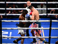 Francesco Paparo and Mohamed Diallo fight during the match for the Italian super featherweight title at TAF 7 at Allianz Cloud Milano in Mil...