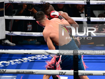 Francesco Paparo and Mohamed Diallo fight during the match for the Italian super featherweight title at TAF 7 at Allianz Cloud Milano in Mil...